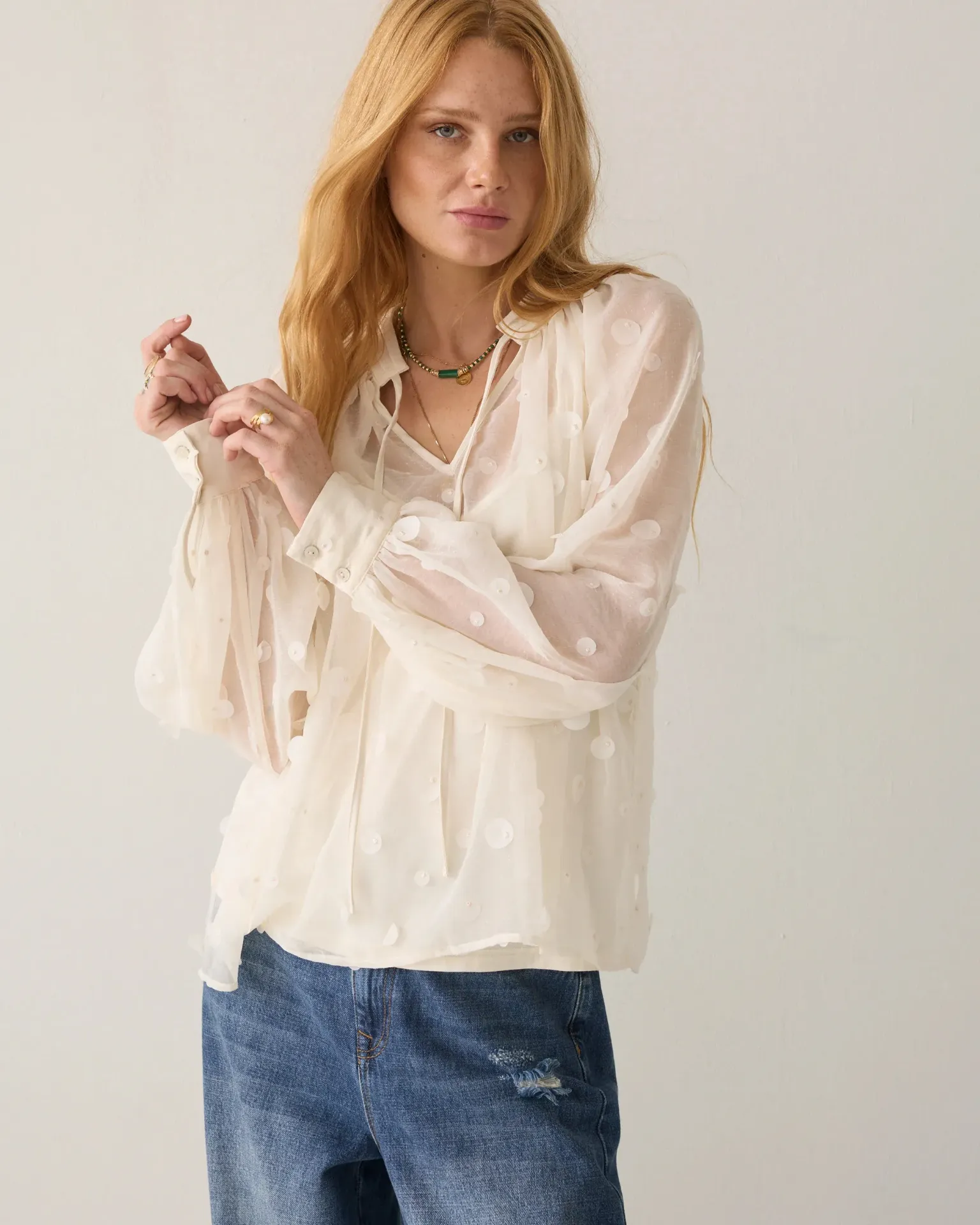 Transparente Bluse mit Pailletten